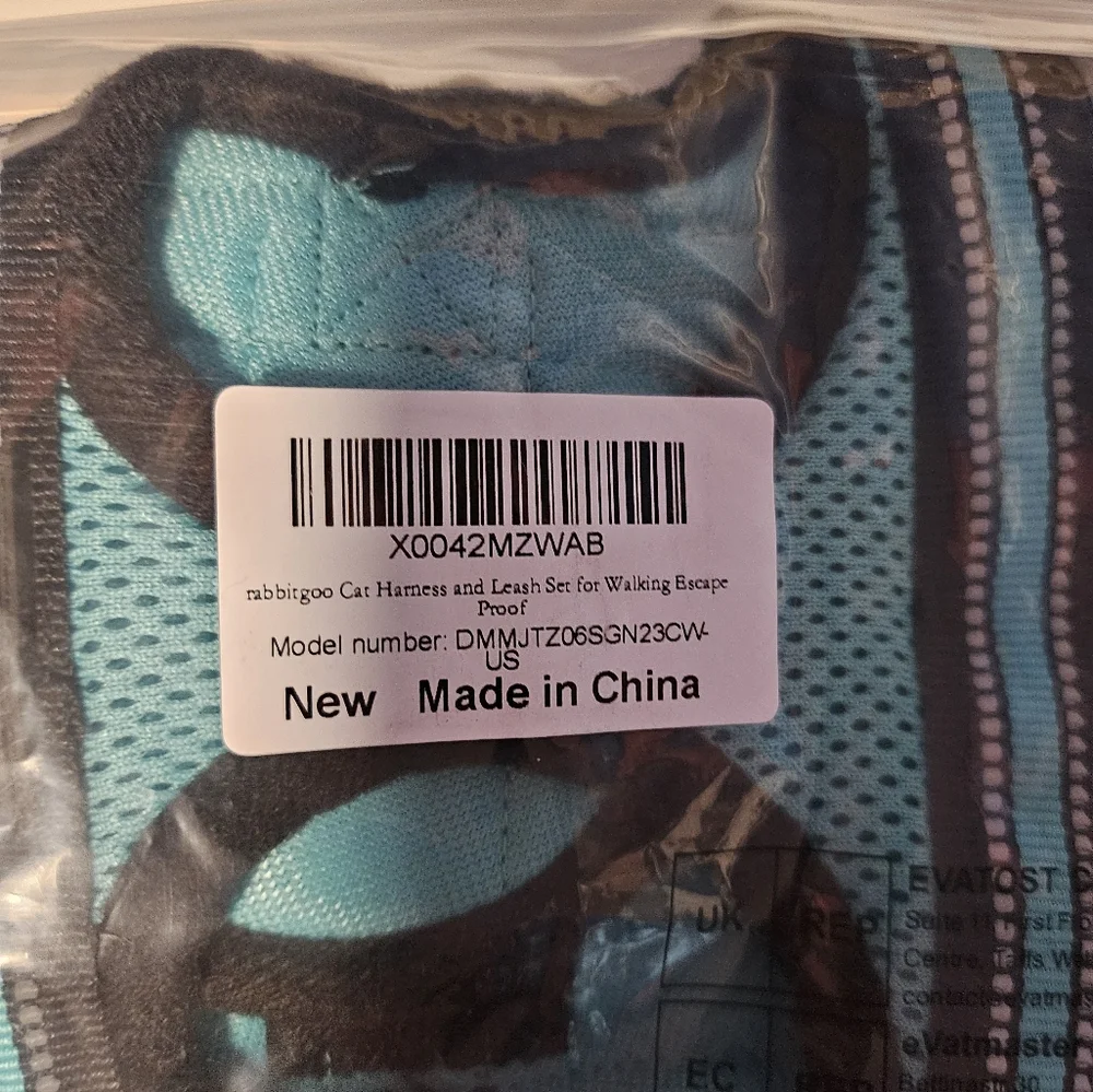 Small animal harness in teal with leash